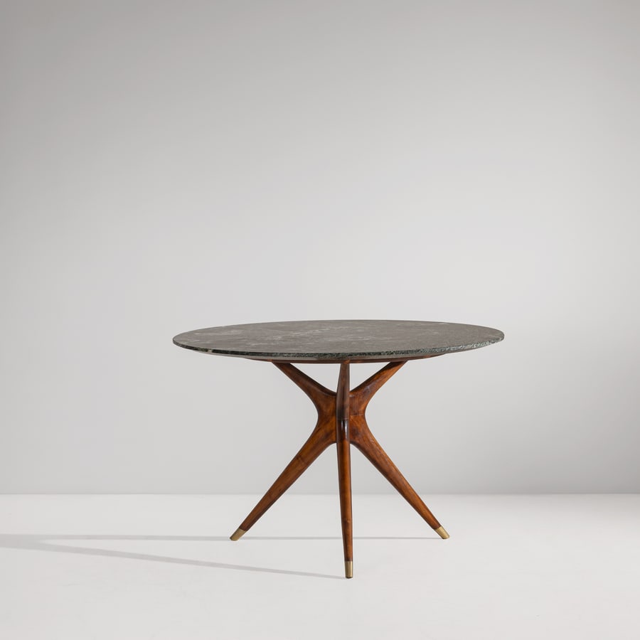 ICO PARISI: Tavolo. Marmo verde alpi, legno di mogano, ottone. Prod. Fratelli Rizzi, anni '50. cm 78x diametro 120 A TABLE BY I. PARISI R. Lietti, Ico Parisi. Design. Catalogo ragionato 1936-1960, Silvana Editori