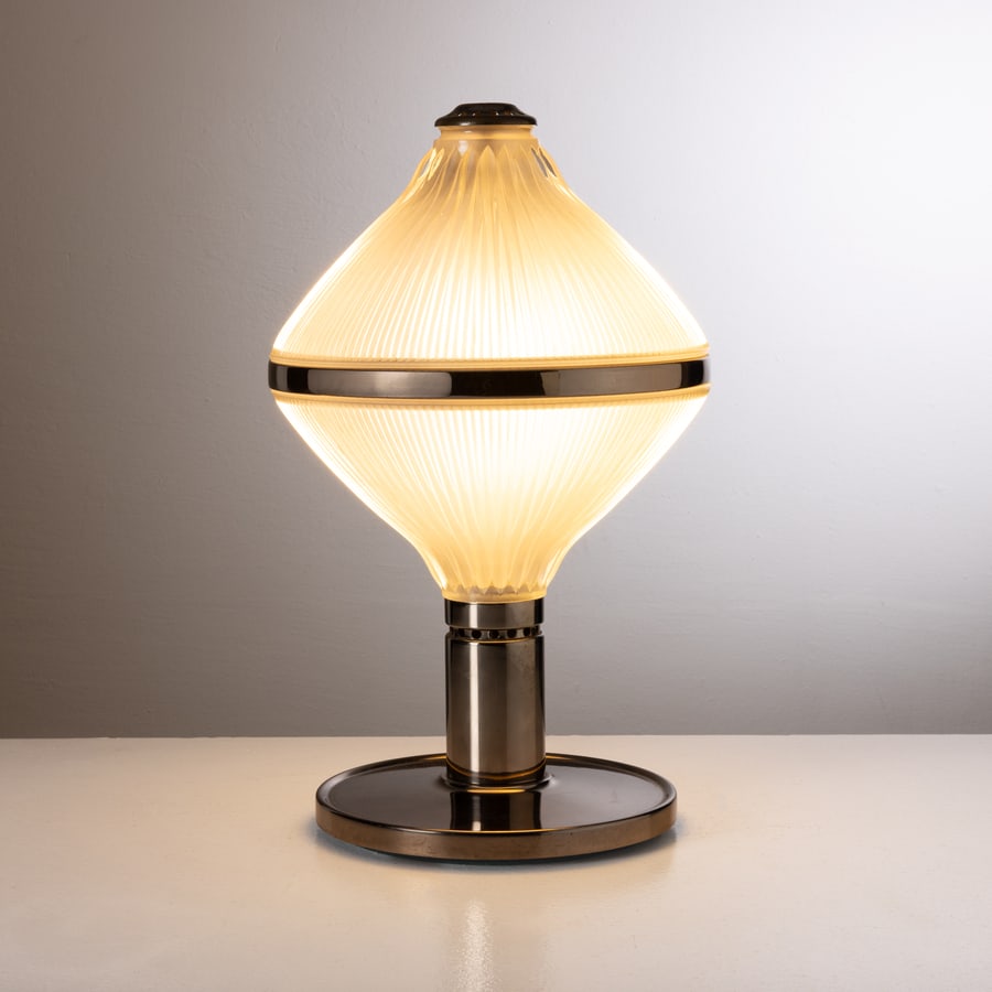 STUDIO BBPR: Lampada da tavolo mod. Aglaia. Ottone, vetro pressato. Produzione Artemide 1963 ca. cm 45x28 A TABLE LAMP BY BBPR Abitare n.16, maggio 1963, p. 44; Ottagono n.4, gennaio 1967, p. 77; catalogo Artemide