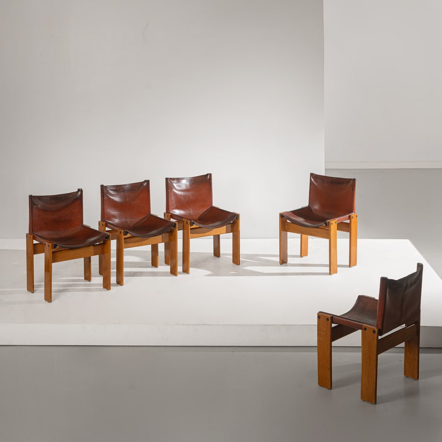 AFRA & TOBIA SCARPA: Cinque sedie mod. Monk. Legno di noce, cuoio. Produzione Molteni 1974 ca. cm 75x51,5x48,5 FIVE CHAIRS BY A. & T. SCARPA G. Gramigna, Repertorio del design italiano 1950-2000 per l'arredamento
