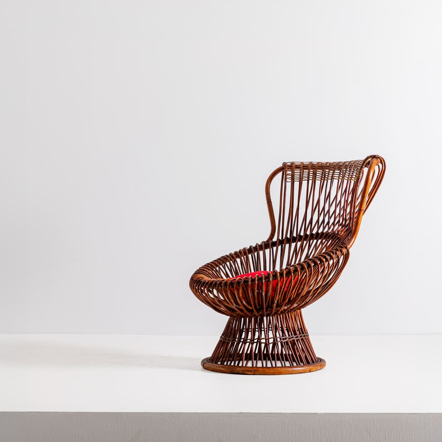 FRANCO ALBINI: Poltrona mod. Margherita. Malacca, bambù, canna d'India, tessuto imbottito. Italia anni '50. cm 94x77x85 AN ARMCHAIR BY F. ALBINI G. Gramigna, Repertorio 1950-2000, Allemandi, Torino, 2003, p.