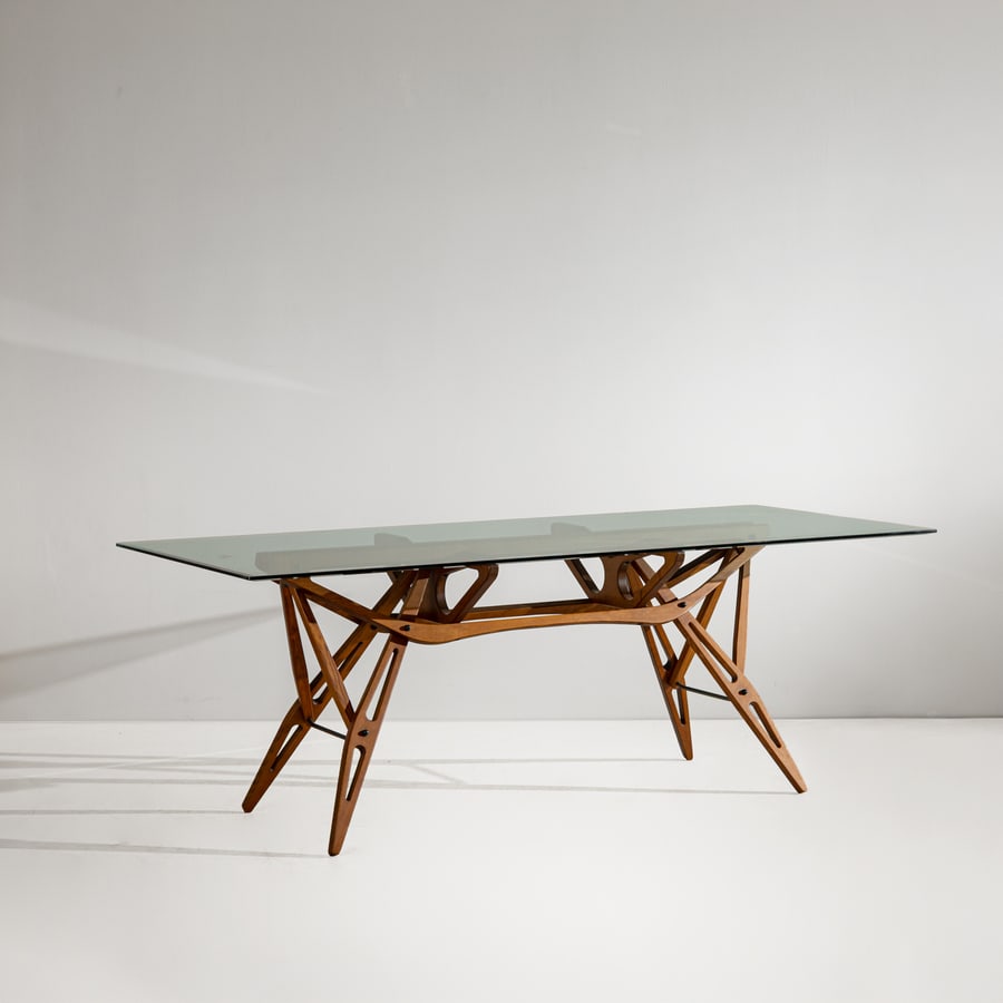 CARLO MOLLINO: Tavolo mod. Reale. Legno massello di rovere, cristallo molato, metallo brunito. Produzione Zanotta, anni '90. Marchio a fuoco del produttore. cm 72x200x90 A TABLE BY C. MOLLINO R. Poletti, Zanotta, El