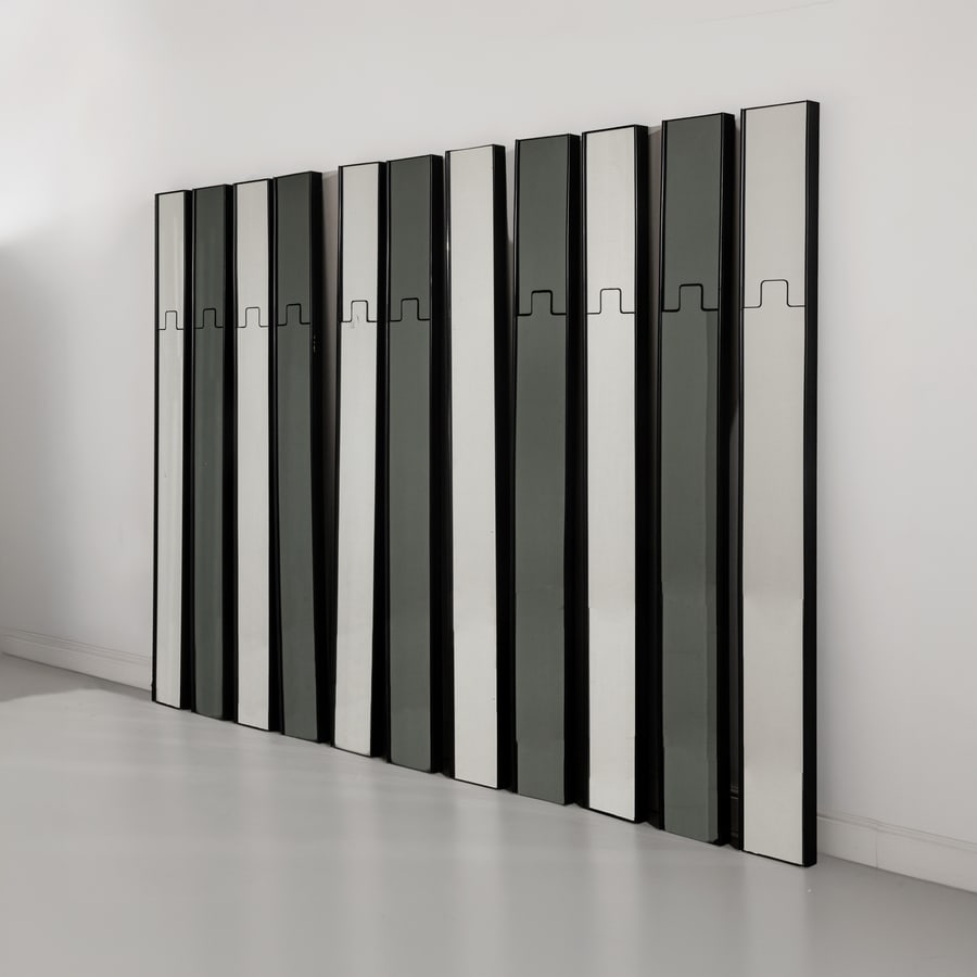LUCIANO BERTONCINI: Undici elementi specchiati. Struttura in ABS e cristallo specchiato con sistema appendiabiti basculante. Produzione Elco, Italia, 1970 ca. ciascuno cm 201x19x6 TEN COAT HANGER PLUS A SINGLE MIRROR BY