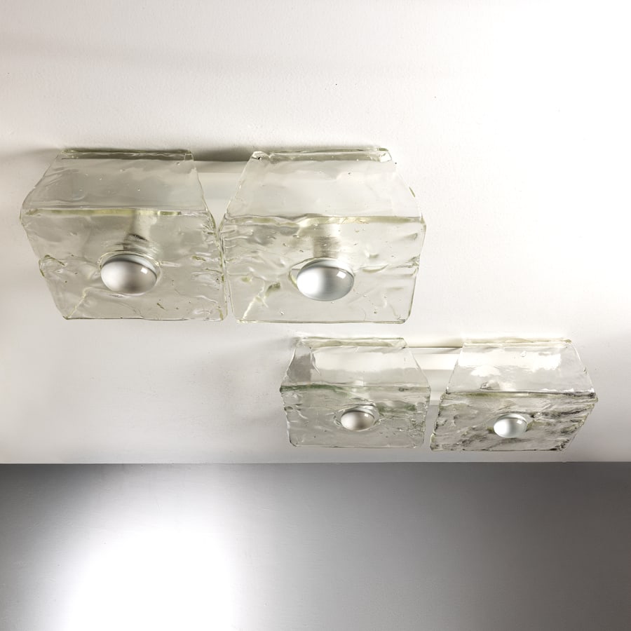 CARLO NASON: Coppia di lampade a plafone. Metallo verniciato, vetro massiccio lavorato a caldo. Produzione A. V. Mazzega anni '60. cm 13x53x30 A PAIR OF CEILING LAMPS BY C. NASON Buone condizioni generali.
