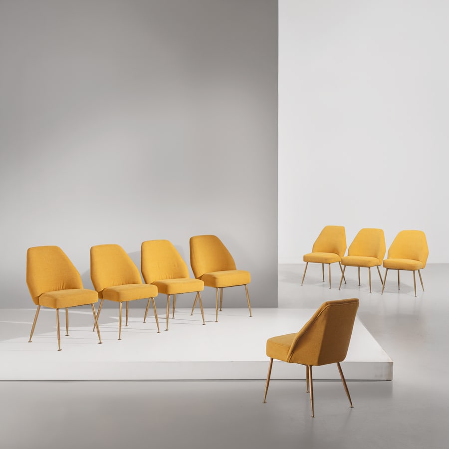 CARLO PAGANI: Otto sedie mod. Campanula. Struttura in legno e ottone, tessuto imbottito. Produzione Arflex 1952 ca. cm 82x52x56 ca. EIGHT CHAIRS BY C. PAGANI Domus n.262 ,ottobre 1951, p. 24, rassegna; Giuliana