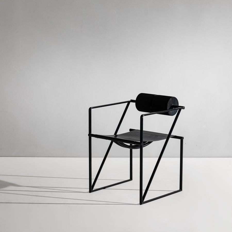 MARIO BOTTA: Poltroncina mod. Seconda. Metallo verniciato, rete metallica smaltata, gomma. Produzione Alias 1982 ca. Marchio del produttore. cm 72x52x59 AN ARMCHAIR BY M. BOTTA G. Gramigna, Le fabbriche del Design