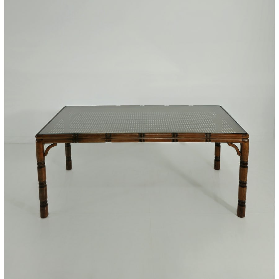 MANIFATTURA ITALIANA: Tavolino. Legno, rattan, vetro. Italia, anni '70. cm 50x119x59 AN ITALIAN LOW TABLE Buone condizioni generali. Piccole righe, leggeri graffi, normali segni di usura.