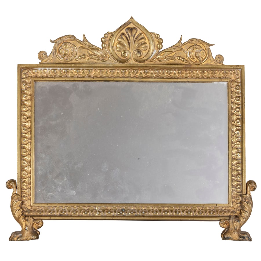 CORNICE DA TAVOLO IN BRONZO DORATO, XIX SECOLO: montata a specchio, completa di supporto posteriore, piedi ferini e cimasa fogliata; minori difetti e poche bruniture nel bronzo Cm 35X38 Luce, cm 18,7X29 A GILDED BRONZE TABLE FRAME, 19TH CENTURY; MI