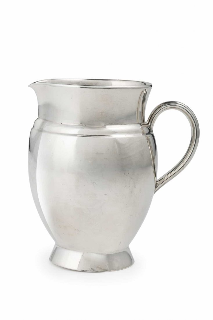 LATTIERA IN ARGENTO, SAN PIETROBURGO, 1885, ORAFO: base circolare, corpo bombato a superficie liscia, manico sagomato - usure Alt. cm 9, larg. cm 9 - peso gr 209 A RUSSIAN SILVER MILK-JUG, ST. PETERSBURG, 1885, MARK OF GRACHEV - WEARS