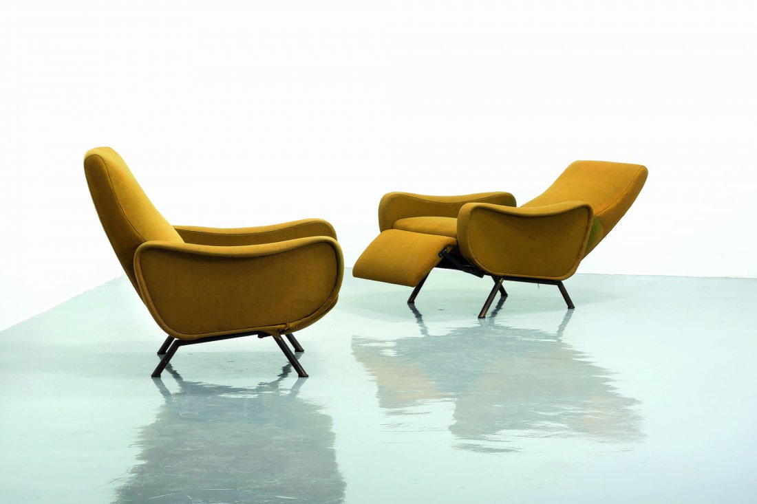 PIZZETTI - 2: Coppia di poltrone reclinabili anni '50. Metallo verniciato, ottone, tessuto imbottito A PAIR OF RECLINING ARMCHAIRS BY PIZZETTIEtichetta della manifattura cm 85x80x86