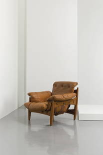SERGIO RODRIGUEZ: A LOUNGE CHAIR BY S. RODRIGUEZ - Poltrona mod. "Sheriff", I.S.A. 1962. Legno , pelle imbottita - Etichetta della manifattura - cm 89x108x95