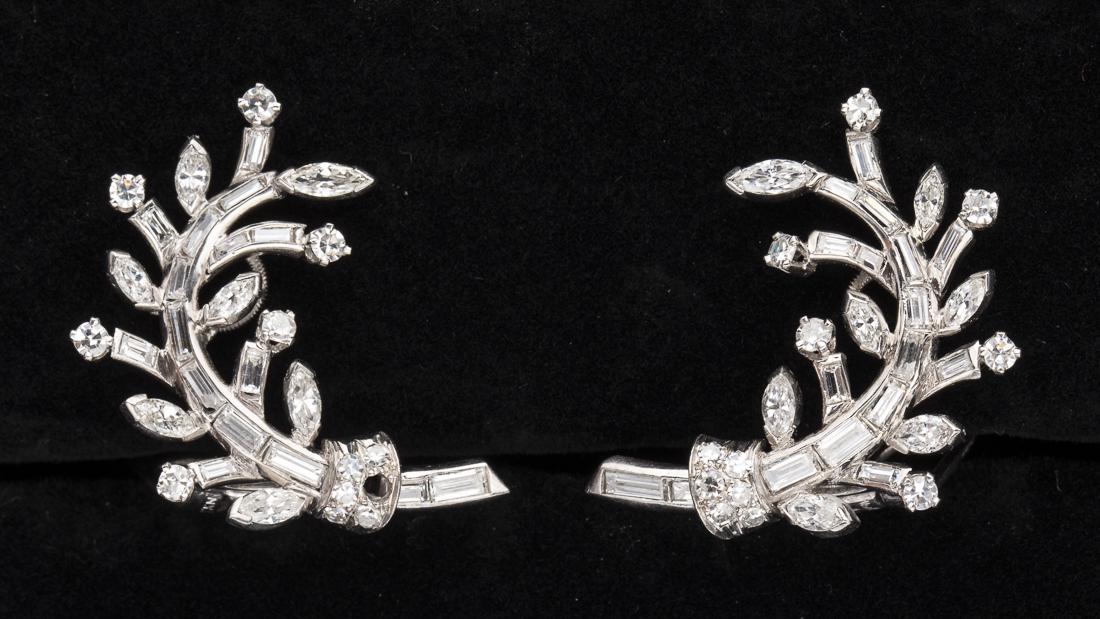 Van Cleef & Arpels Diamond & Platinum Spray Earrings: Property from a Savannah, GA Estate with round baguette and marquis diamonds in a spray design. FG color, VS clarity. 5.08 dwt. Size: 1 in.