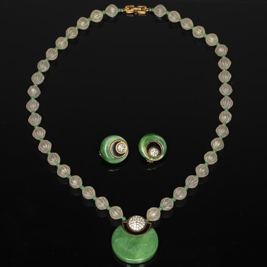 Givenchy Art Deco Style Necklace and Earrings: Property from a Savannah, GA Estate comprising an art deco style beaded green, black and gold costume necklace with a circular green pendant and imitation diamonds marked 'Givenchy', and a pair of rou