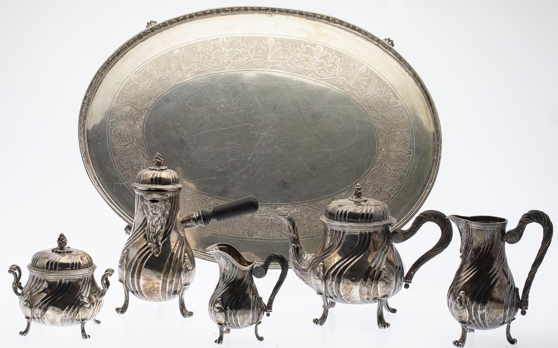 5 Piece French Sterling Silver Tea Set: Property from the Estate of Judie Weiss Formerly in the Collection of Moses Weiss, NYC comprising one teapot, one chocolate pot, one small and one large creamer, and one lidded sugar bowl, all marked