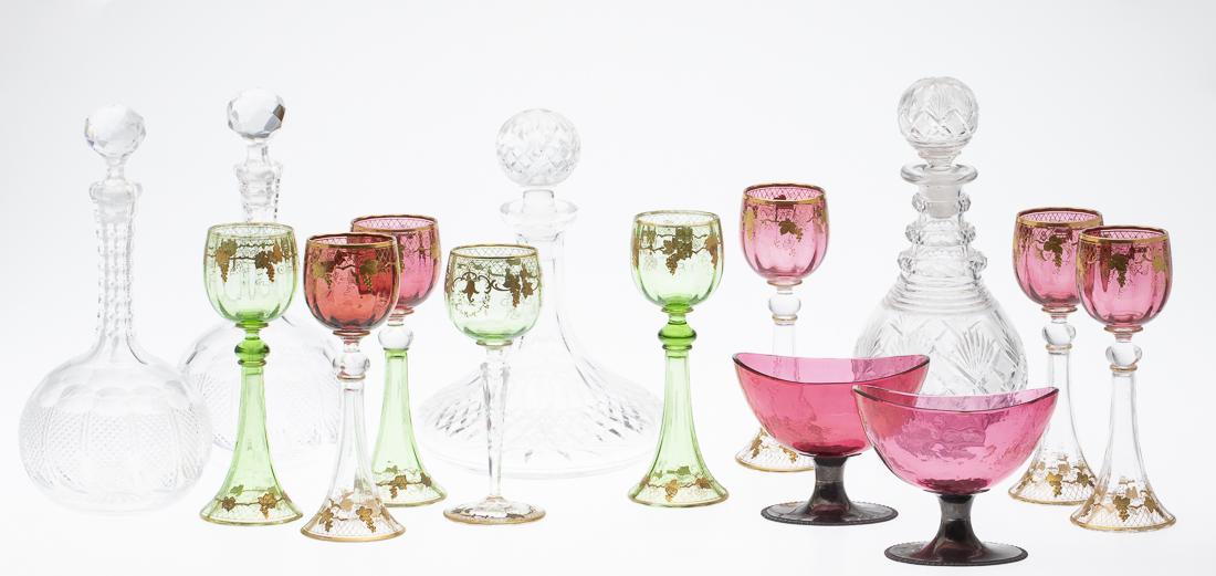 4 Decanters, Pair of Compotes and 8 Wine Glasses: Property from a Southern Estate comprising four various sized decanters, two red glass and sterling silver compotes marked 'James Robinson New York' and with British hallmarks, 7 red and green colored