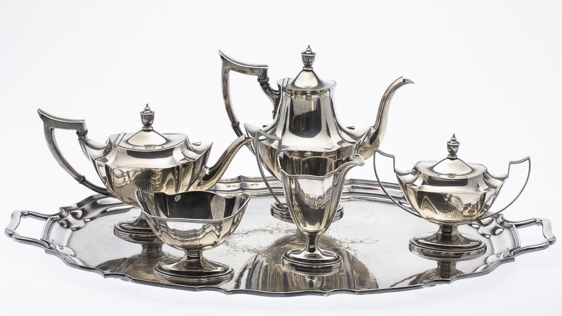 Gorham Sterling Silver Tea & Coffee Service and Tray: Property from a Florida Estate comprising one tea pot, one coffee pot, one creamer, one sugar bowl, and one footed bowl all monogramed and marked with Gorham hallmarks, with a silverplate tray marked 