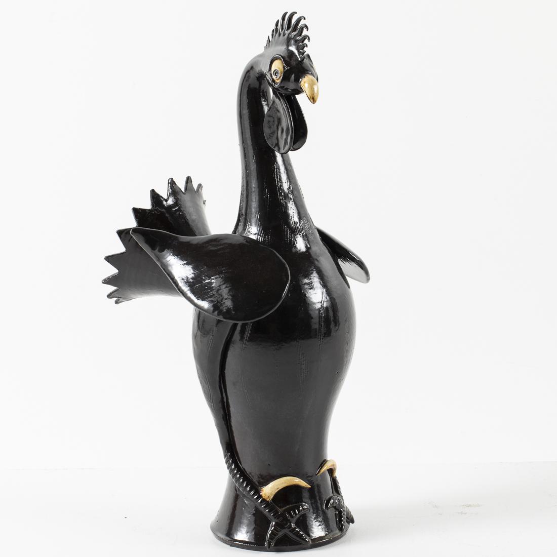 Roger Corn Rooster, 2001: Property from a Private Collection, Georgia signed on bottom and base bellow tail, "Rooster by Roger Corn, Banks County, GA, 2001." H. 24 in. x W. 9 1/2 in. x D. 13 in. Wayne Hewell is a 5th generatio