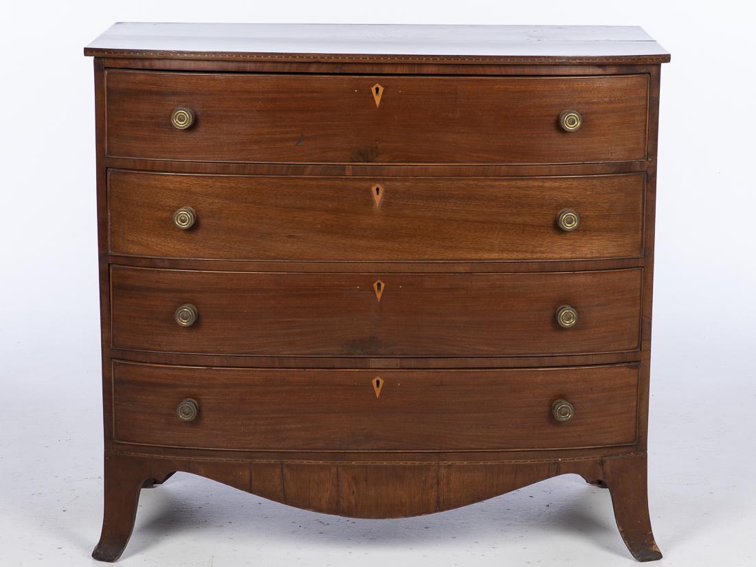 George III Style Mahogany Bowfront Chest, 19th C.: Property from a Florida Estate with four graduated drawers on French feet. H. 38 in. x W. 41 3/4 in. x D. 18 in.
