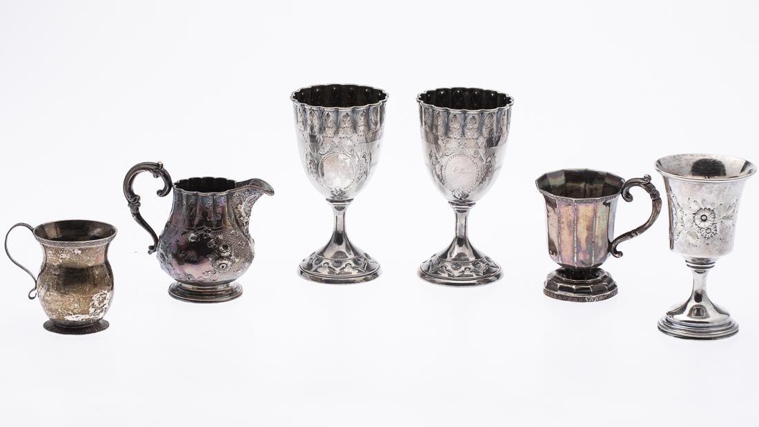 6 Coin Silver Articles: Property from a Savannah Estate comprising a pair of goblets engraved 'Ellen' and unmarked, a single goblet, two handled cups the smaller one engraved "Ellen" and unmarked the other marked 'Curry, Phi