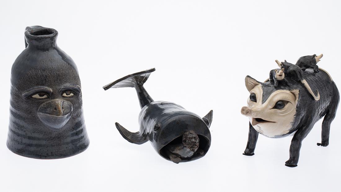 3 Pieces of Whimsical NC Pottery: Property from a Private Collection, Georgia including Jonah and the Whale signed 'Lin Craven, 1999,' a possum signed 'Lin Craven', 2001 and a face jug signed 'Yardbird, 2003, Ila, GA.' Size of jug: H.