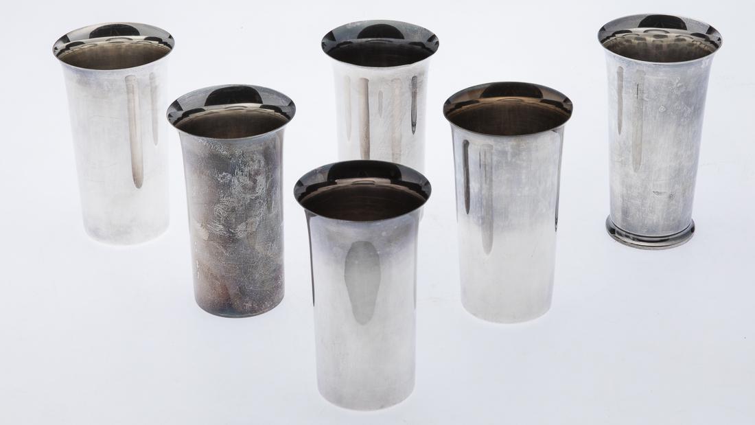 6 Sterling Silver Mint Julep Cups: Property from a Savannah Collector all marked sterling silver, three alike, one pair, and another. 21.73 troy ounces. Size of pair: H. 5 in. x W. 3 in.