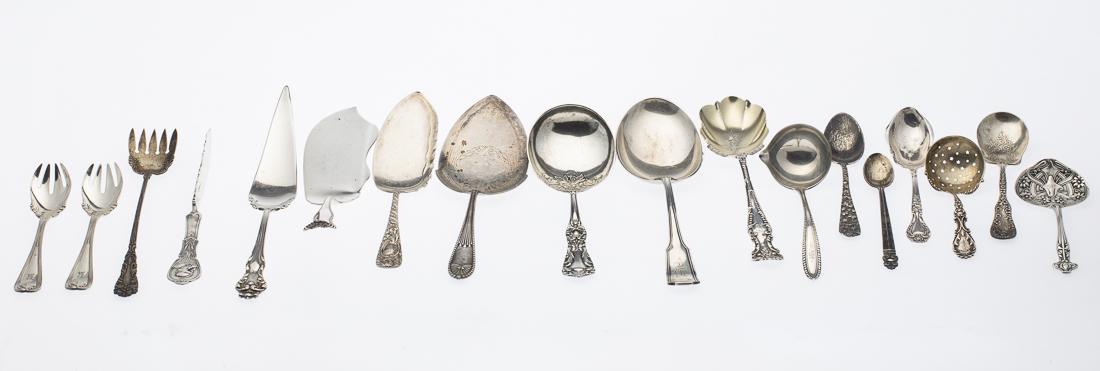 18 Sterling Silver Serving Utensils Includes Tiffany: Property from a Savannah, GA Estate comprising two Tiffany & Co. sporks, one Royal Danish teaspoon, one spoon, two small serving spoons, one flat serving spoon, three large serving spoons, one butter
