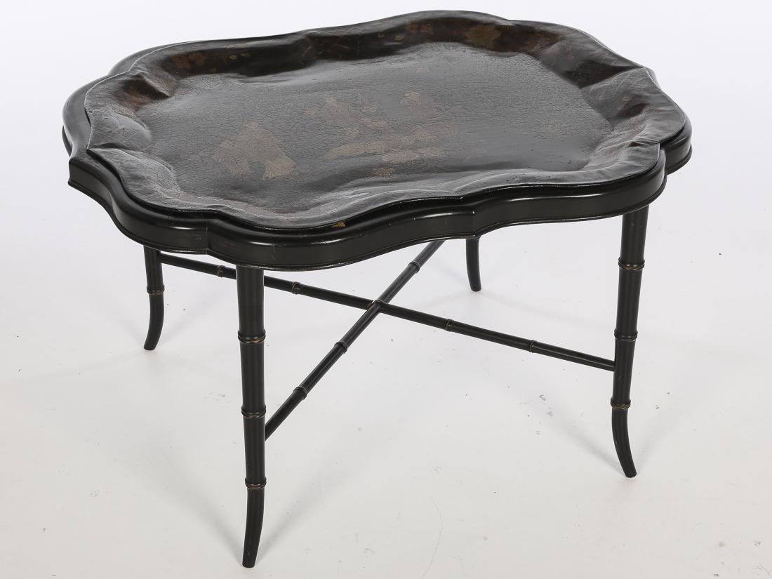 English Tole Tray on Later Stand, 19th Century: Property of a Private Collection, Savannah, GA decorated with Chinoiserie figures. Size of stand: H. 18 1/4 in. x W. 30 1/4 in. x D. 22 in.