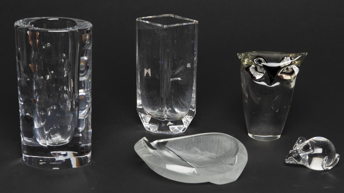 5 Glass Articles, Including Lalique and Steuben : Property from the Estate of Judie Weiss Formerly in the Collection of Moses Weiss, NYC comprising a Sevres oval shaped vase, a Kosta diamond shaped vase, a Lalique etched dish, a Steuben mouse figurin