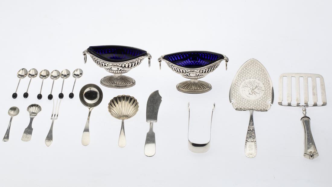17 Miscellaneous Sterling Silver Items Incl. Tiffany: Property of a Private Collection, Savannah, GA comprising two English sterling salt dishes with blue glass inserts, one Canfield Bro & Co. pie cutter engraved with bird design and monogramed, German s