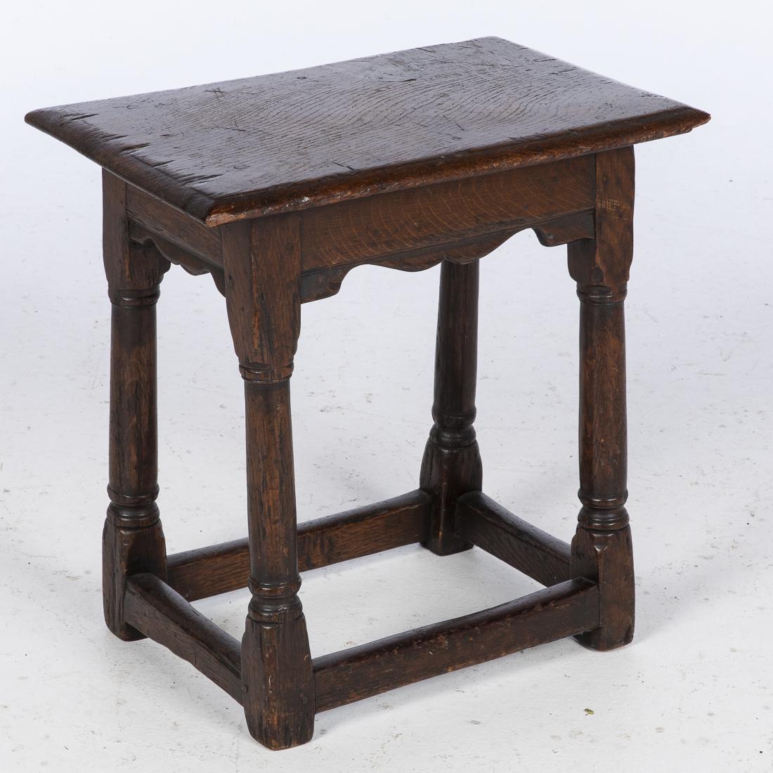 English Oak Joint Stool, 19th century: Property from the Estate of Judie Weiss Formerly in the Collection of Moses Weiss, NYC the rectangular top raised on circular turned legs joined by stretchers. H. 20 in. x W. 20 in. x D. 12 3/4 in.