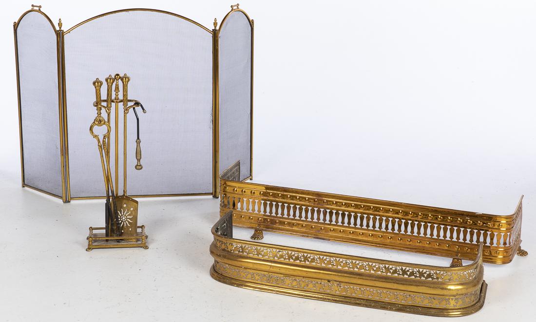 Group of Brass Fireplace Equipment, 19th C and later: Property from a Savannah, GA Estate comprising a Victorian pierced fender, a Victorian style larger pierced fender on paw feet, a set of firetools with poker, tongs, shovel and stand and a modern scre