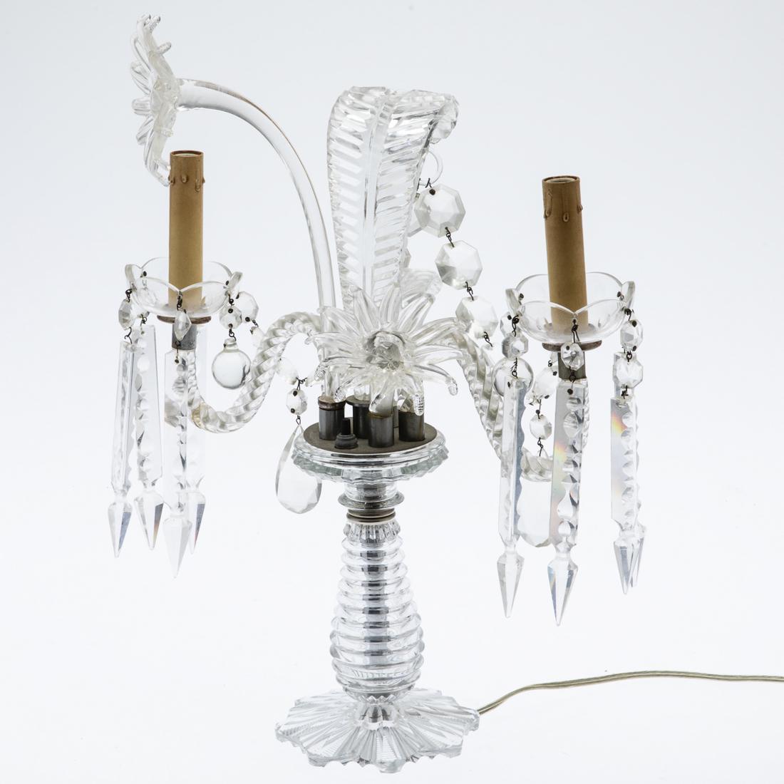 Venetian Two Light Candelabra, Electrified: Property from the Collection of Lady Grundy, Cocoa Beach, FL Venetian Two Light Candelabra, Electrified, issuing two scrolling candlearms with prisms and floral decoration. Height: 18 1/2 in. x Width: