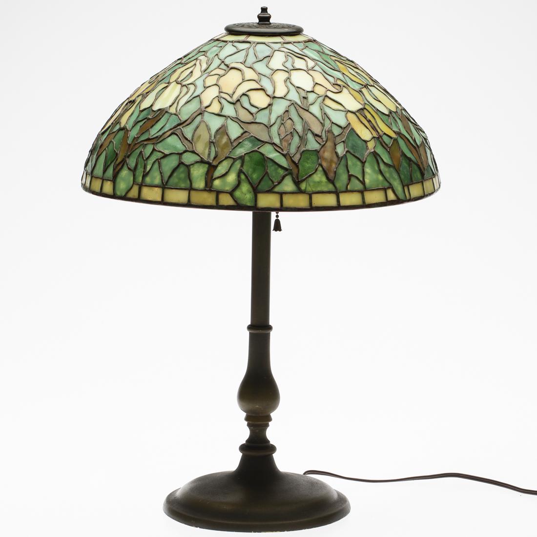 Stained Glass Lamp with Iris: Property from a South Carolina Collector marked 'Tiffany Studio, New York' on underside of shade, assumed to be a copy. H. 20 in. x W. 14 in. x D. 14 in.
