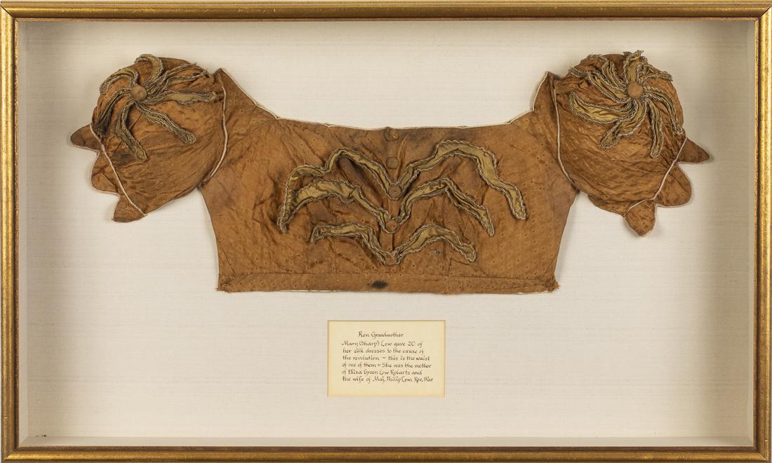 Framed Bodice with Savannah Provenance, 18th Century: Property from a Savannah Estate in a shadowbox frame, with label that reads: 'Rev. Grandmother, Mary (Sharp) Low gave twenty of her silk dresses to the cause of the Revolution - This is the waist of o