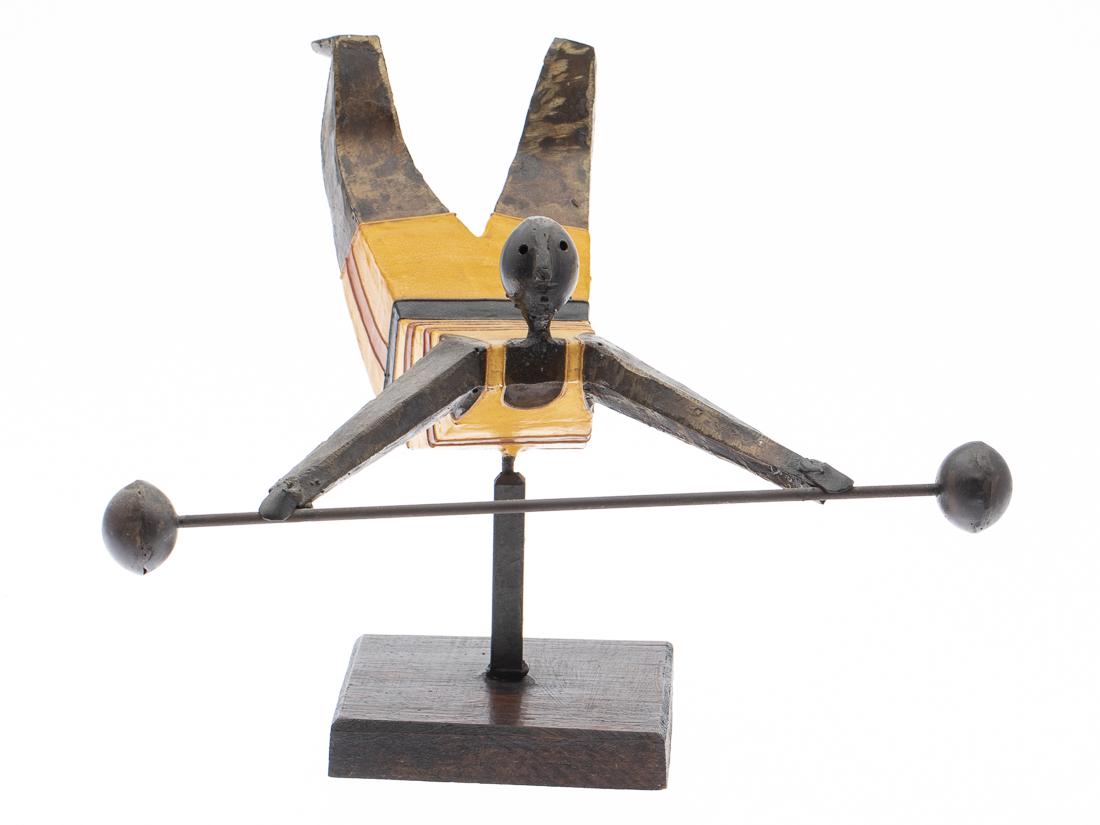 Luis Felguerez (b. 1935), Sculpture of an Acrobat: Property from the Estate of Judie Weiss Formerly in the Collection of Moses Weiss, NYC signed "Felguerez" on the side of the left leg, depicting a figure in mid air holding a dumbbell, supported on a 