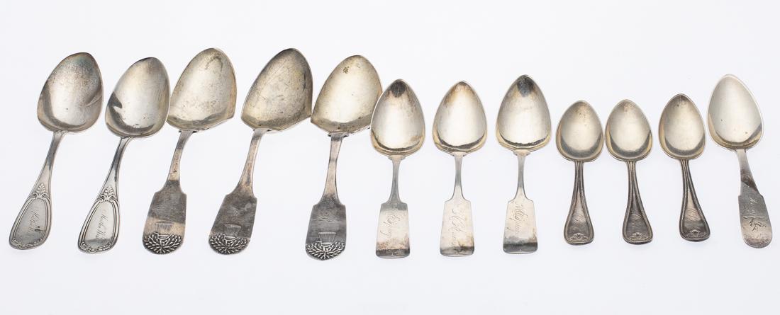 12 Various Coin Silver Spoons: Property from a Savannah, GA Estate comprising 3 like spoons marked 'H.L. Webster Co.' and engraved 'M.L. Foster', three like spoons marked 'N. M. Matson' with various engravings, one spoon marked 'S.
