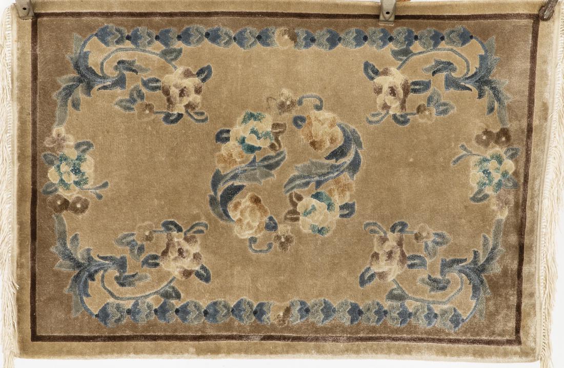 Modern Chinese Small Silk Rug: Property from the Collection of Lady Grundy, Cocoa Beach, FL Modern Chinese Small Silk Rug, in tones of blue, cream, on a light grey found, decorated with flowers. Length: 3 ft. 1 in. x Width: 2 in.