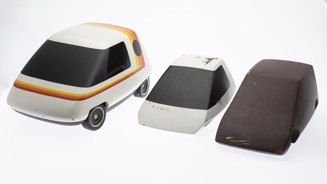John Bucci, Three Electric Concept Car Models: (Illinois, 1935-2019), two models unfinished. Size of largest: H. 8 in. x W. 17 in. x D. 10 in. John Bucci, who worked from a studio in Chicago, created concept cars, one of which "La Shabbla" was exh