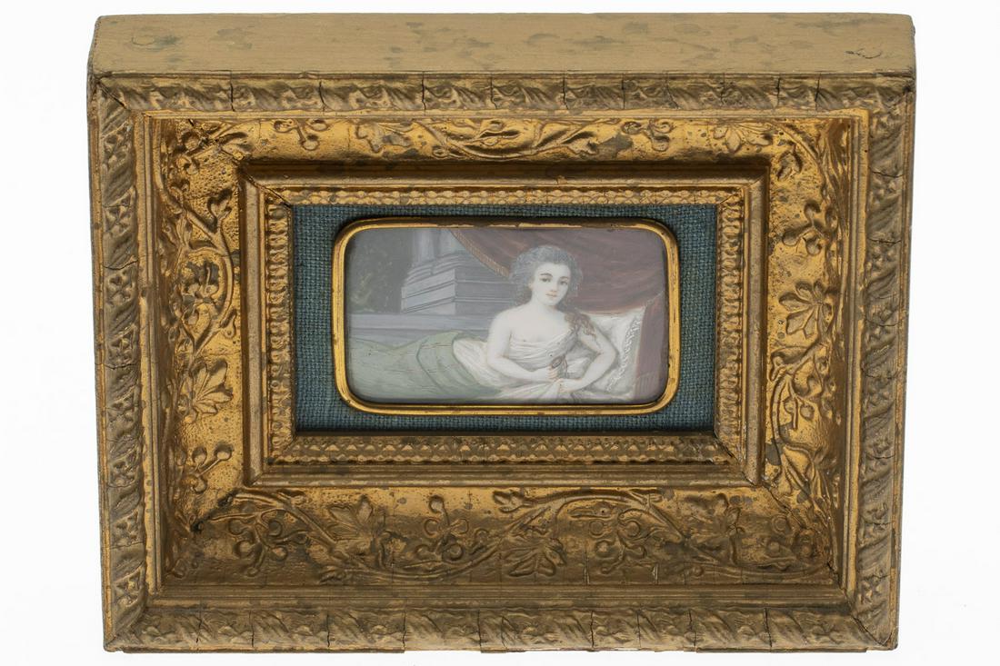 Miniature Portrait of a Reclining Woman, 19th C.: Miniature Portrait of a Reclining Woman, 19th C., unsigned, depicting a reclining woman in an interior, in a giltwood frame. Frame size: 6 in. x 7 1/2 in. MEASURMENTS: Height: by sight 1 3/4 in. x Wid