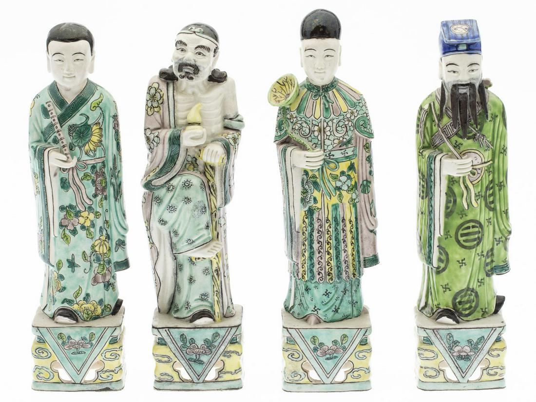Group of 4 Chinese Porcelain Figurines: Group of 4 Chinese Porcelain Figurines, comprising a male figure holding a flute, a figure holding a plant, a figure with long beard, and an older figure holding a cane. MEASURMENTS: Height: of talles