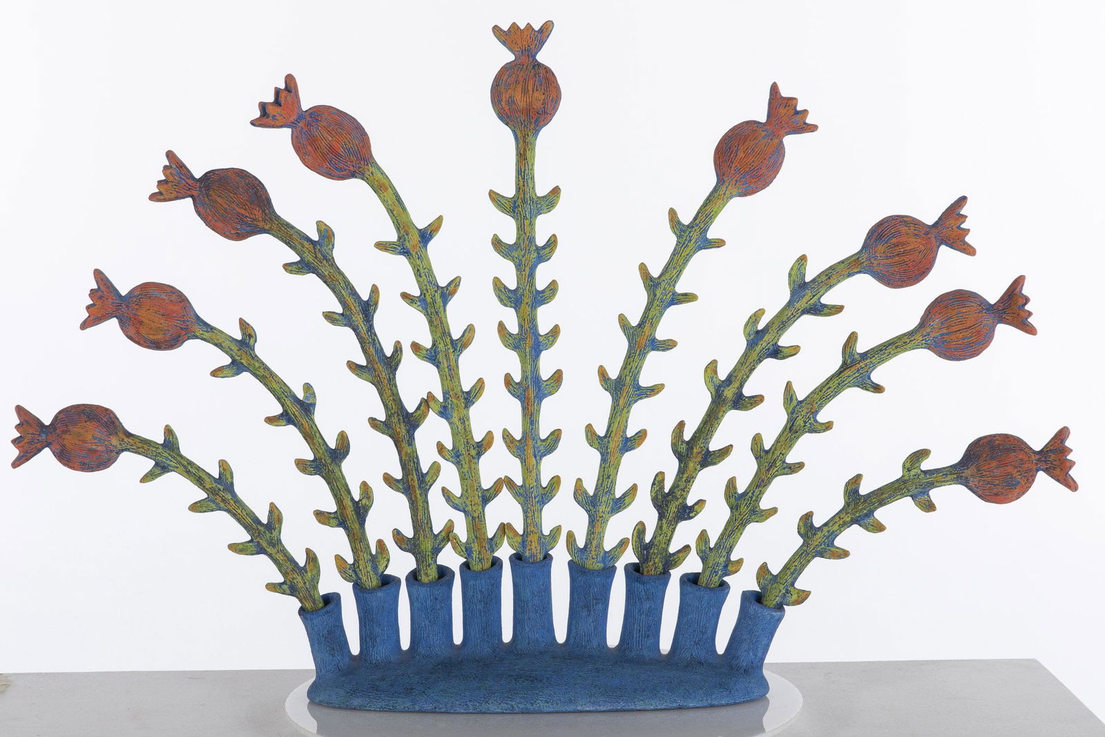Ingrid Nicolai, Ceramic Floral Sculpture: Ingrid Nicolai, Ceramic Floral Sculpture, (Canadian, 21st/20th Century) signed, dated '99 and numbered '230' on base, blue base with removable flower stalks (stalks numbered on bases). Ingrid Nicolai'