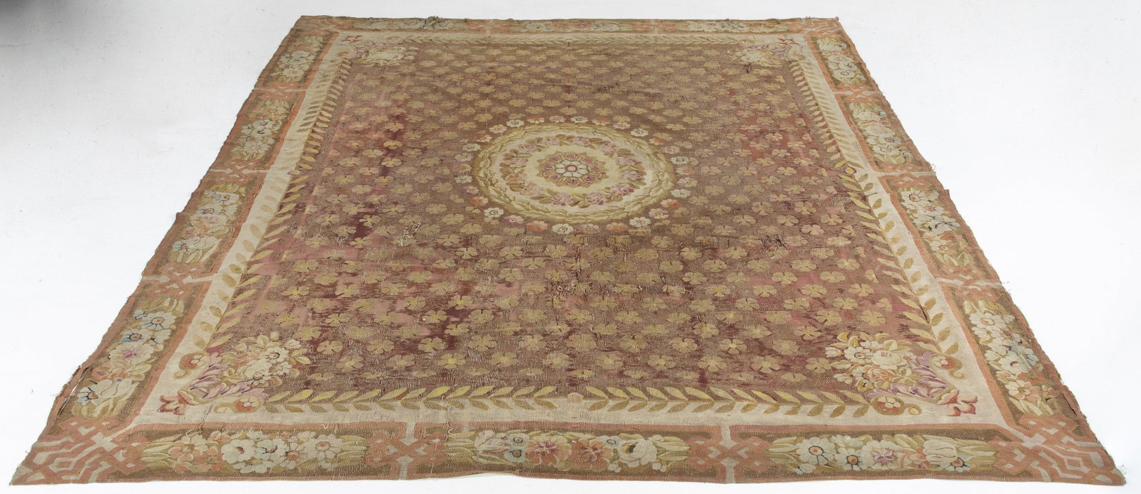 French Aubusson Carpet, 19th Century: French Aubusson Carpet, 18th Century, in tones of green, pink, blue, and cream on a red ground. MEASURMENTS: Length:11 ft. 1 in. x Width: 12 ft. 1/2 in.