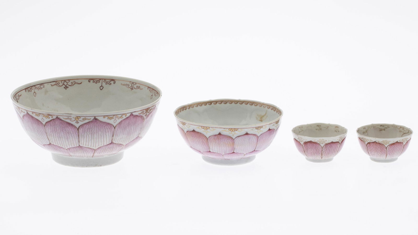 Two Chinese Export Lotus Bowls & Two Cups, 18th C: Two Chinese Export Lotus Bowls and Two Cups, 18th Century, comprising a 8 in. lotus bowl and a 5 3/4 in. lotus bowl and two 3 in. lotus tea cups. MEASURMENTS: Height: of largest bowl 4 in. x Width: 8