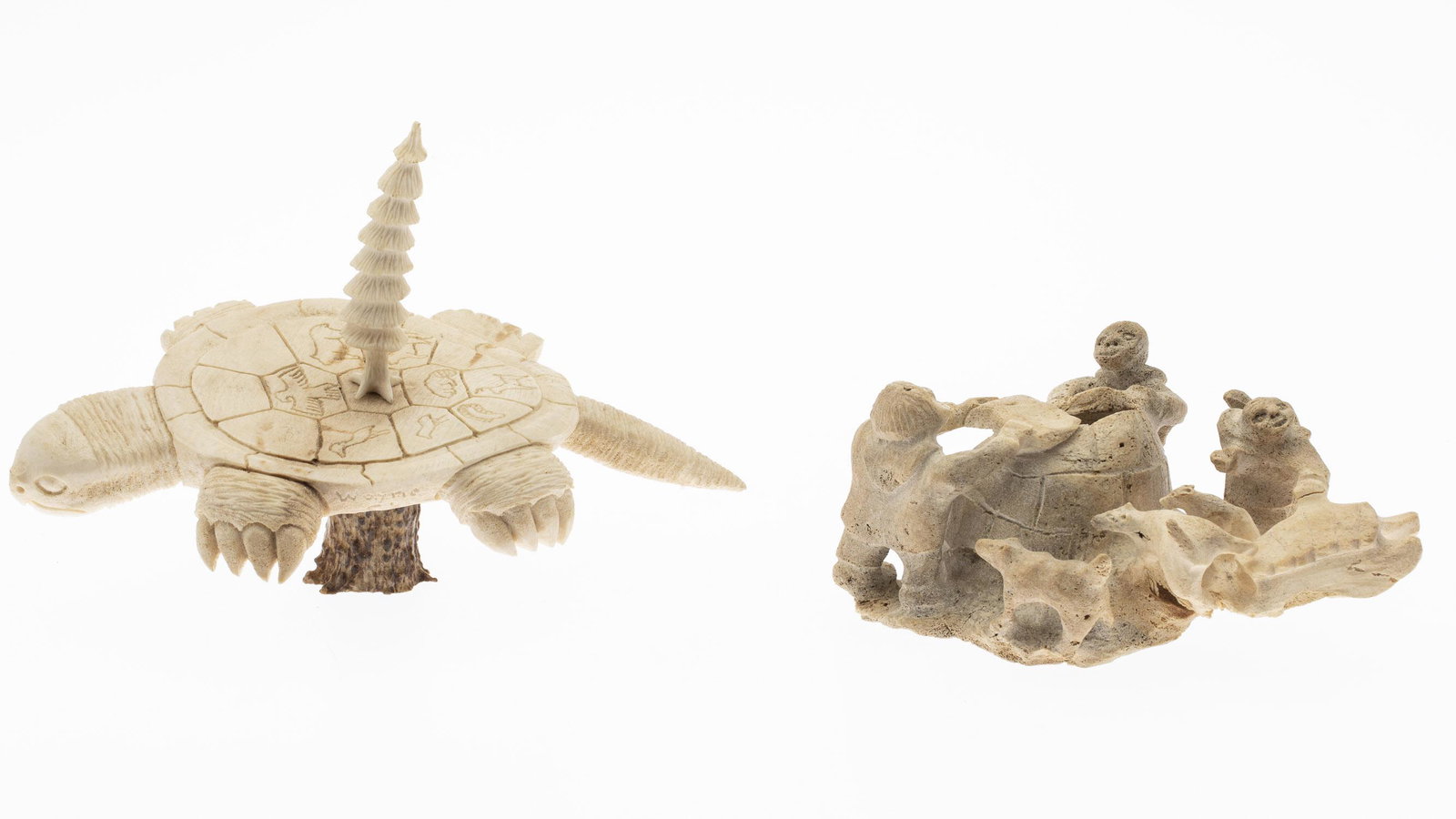 Two Inuit Carvings: Two Inuit Carvings, comprising a bone carving depicting a turtle titled 'Together', on a antler stand (signed Wayne Skye on the side of the turtle, purchased in 1997 at Ninavik Native Arts, Canada reg