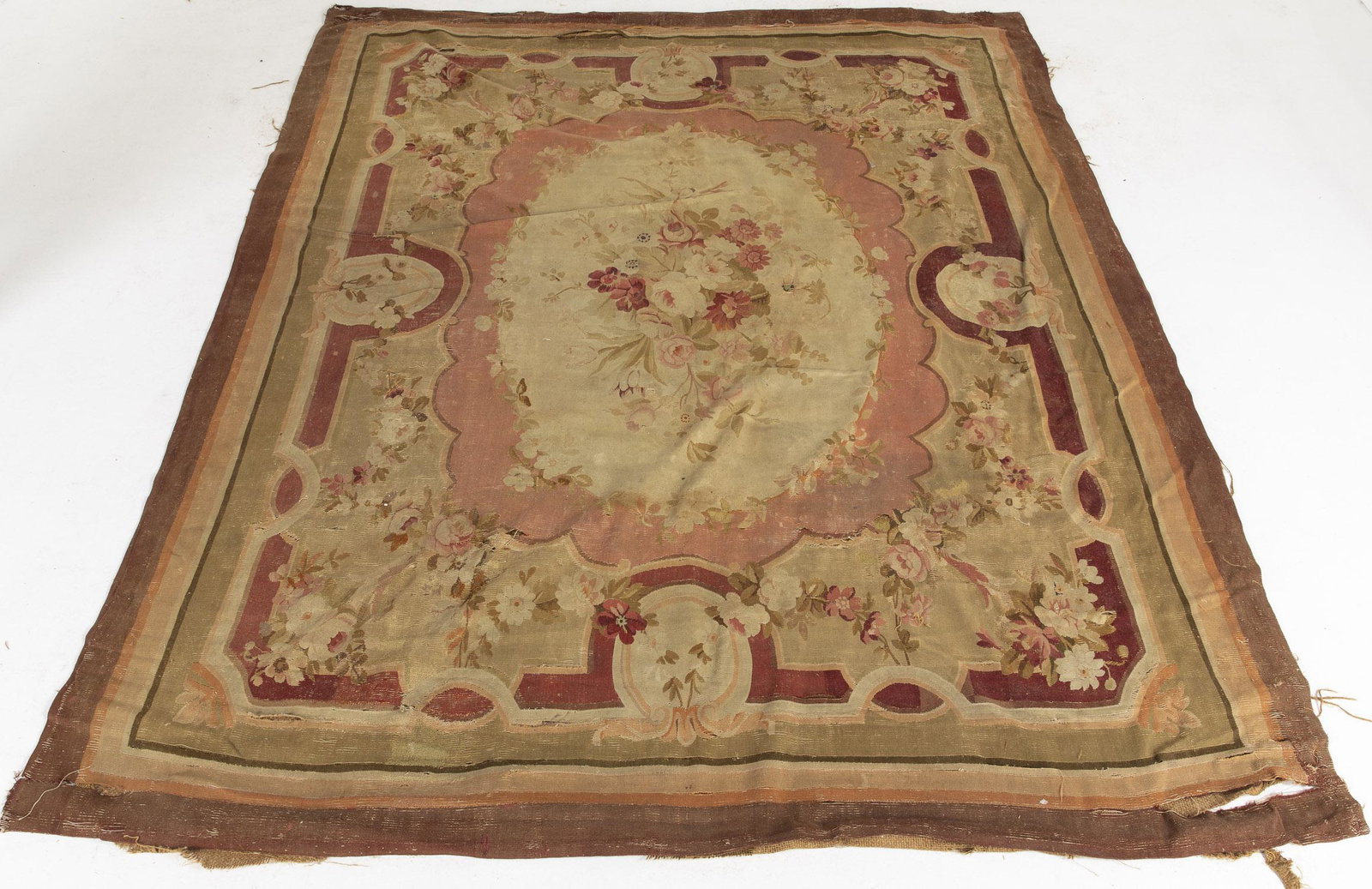 Aubusson Carpet, 19th Century: Aubusson Carpet, 19th Century, in tones of pink, red, and green on a cream ground. MEASURMENTS: Length:8 ft. 5 in. x Width: 10 ft. 3 in.