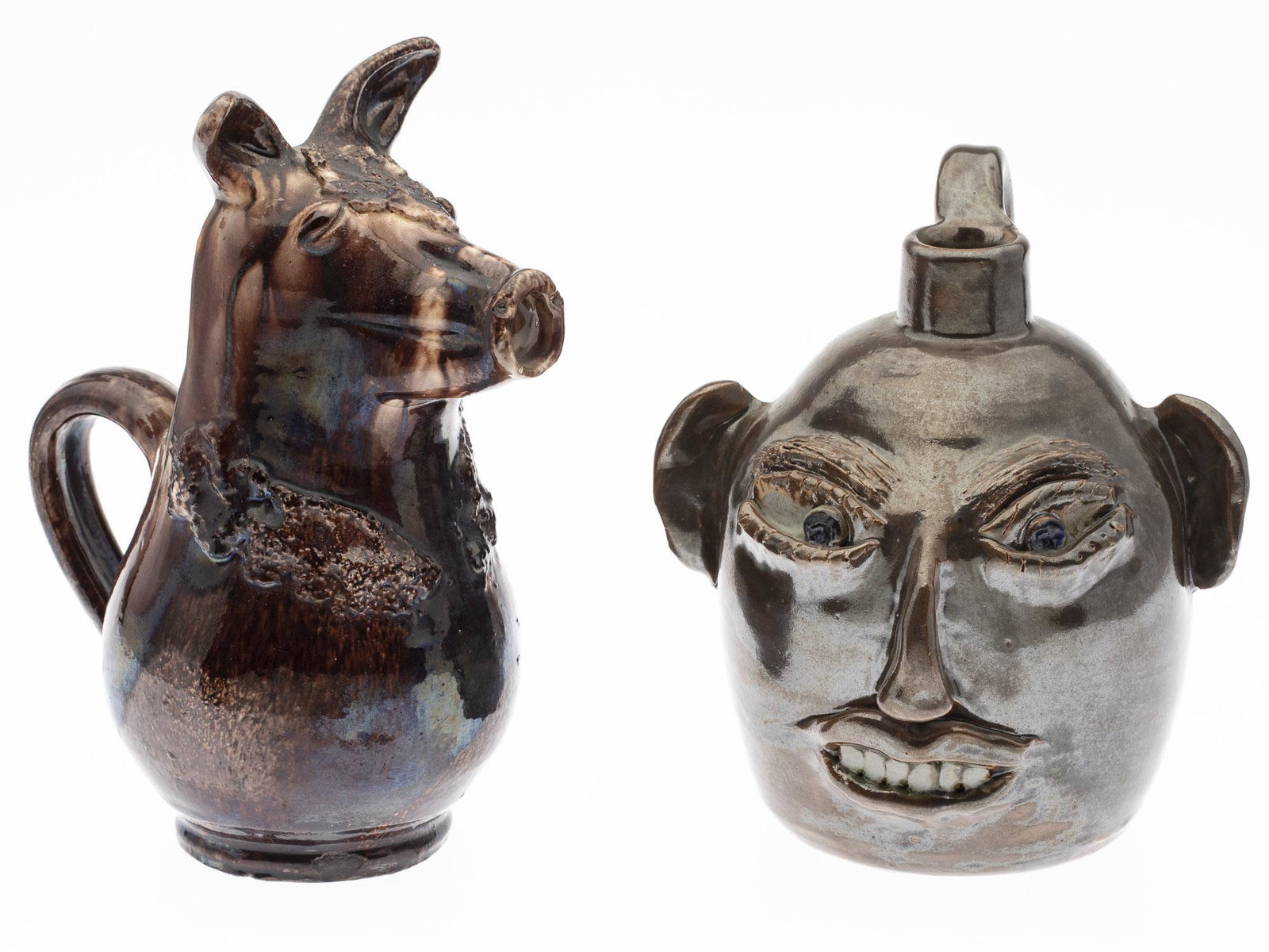 Jerry Brown Face Jug and Animal-Form Pitcher: Jerry Brown Face Jug and Animal-Form Pitcher, the face jug signed and dated '2/91, Jerry Brown, Hamilton, AL', the animal pitcher unmarked. Size of pitcher: 10 in. x 5 in. x 7 in. MEASURMENTS: Height: