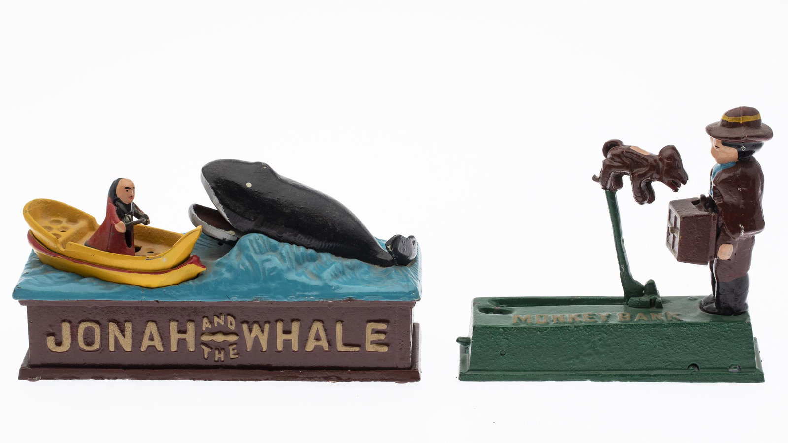 Two Mechanical Piggy Banks, Modern: Two Mechanical Piggy Banks, Modern, comprising Jonah and the Whale and a monkey grinder mechanical piggy bank. MEASURMENTS: Height: 5 in. x Width: 9 in. x Depth: 3 1/4 in.