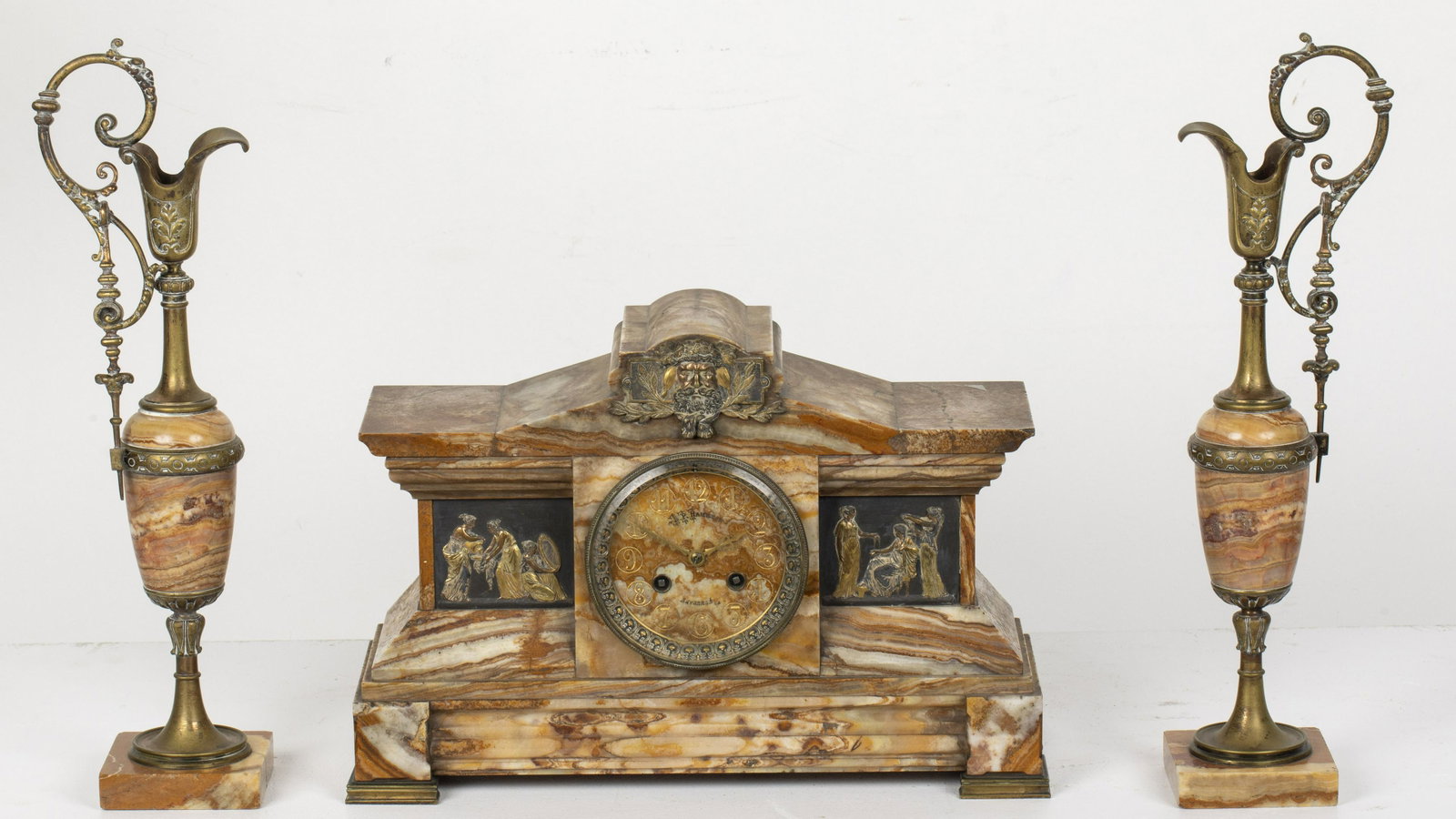 Grecian Revival Mantle Clock and Garniture, Savannah: Property from a Savannah, GA Estate Relocated from Windham, CT Description: Grecian Revival Mantle Clock and Garniture, Savannah, the clock face marked 'S.P. Hamilton, Savannah' with two train mov