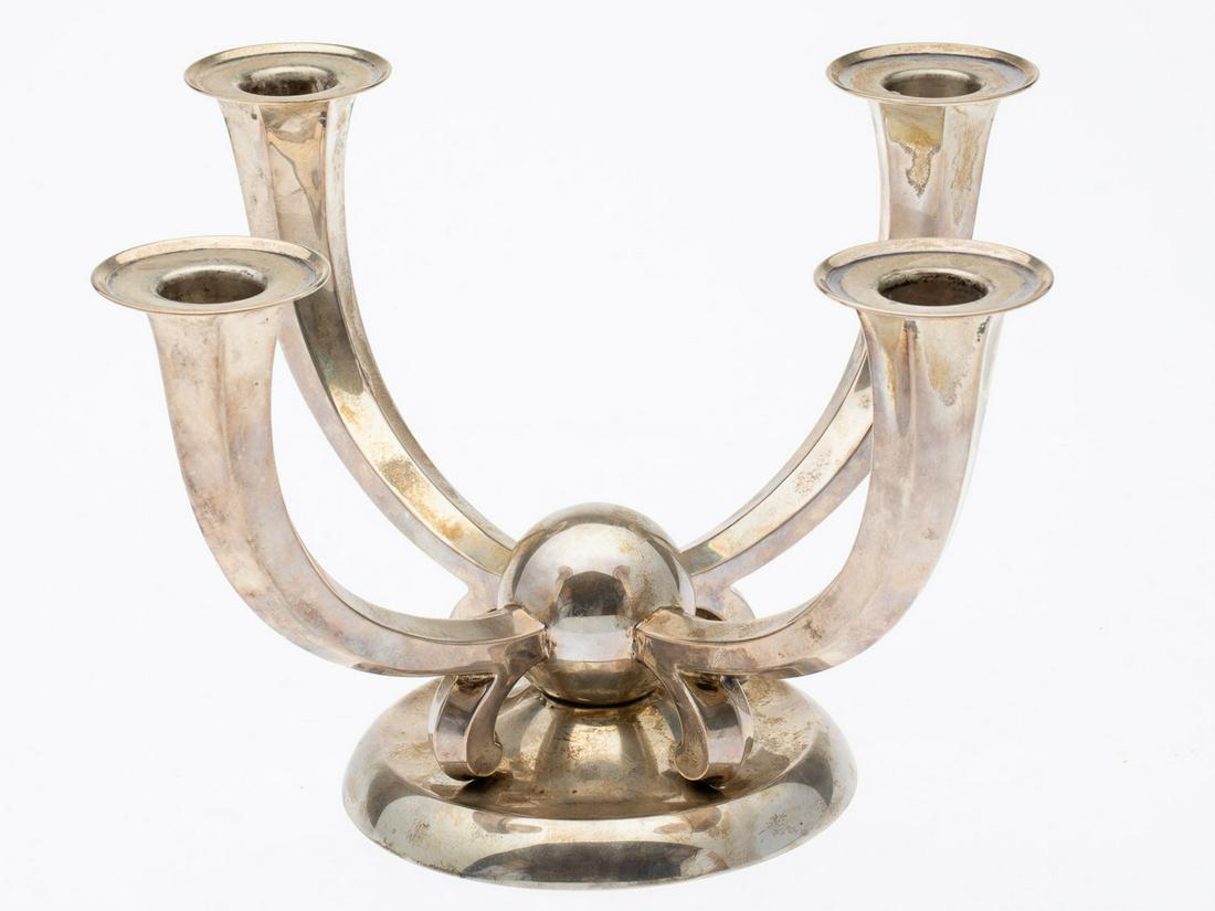 German Art Deco Silver Four Light Candelabra: Property of a Florida Collector Description: German Art Deco Silver Four Light Candelabra, with German hallmarks '2470' and '835' on underside. 14.33 troy ounces. Measurements: