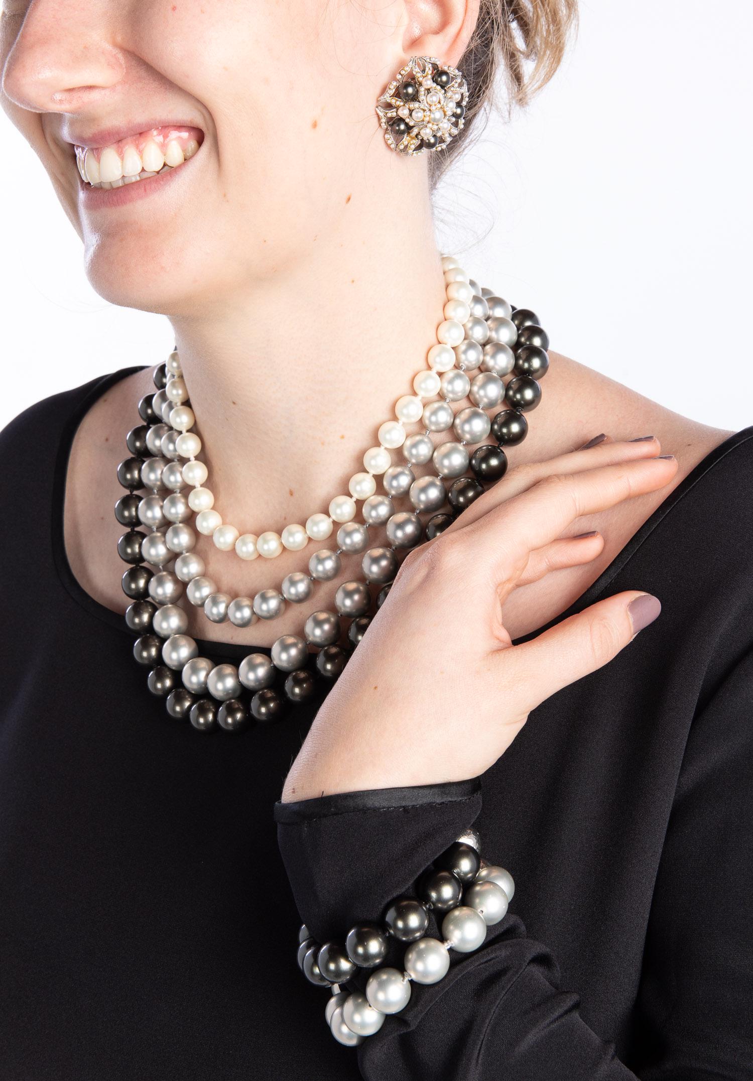 Jose and Maria Barrera Necklace, Bracelet & Earrings: Clothing and Accessories from the Estate of Jeanne Robertson Description: Jose and Maria Barrera Necklace, Bracelet & Earrings, comprising a four strand ombre faux pearl necklace with crystal hook
