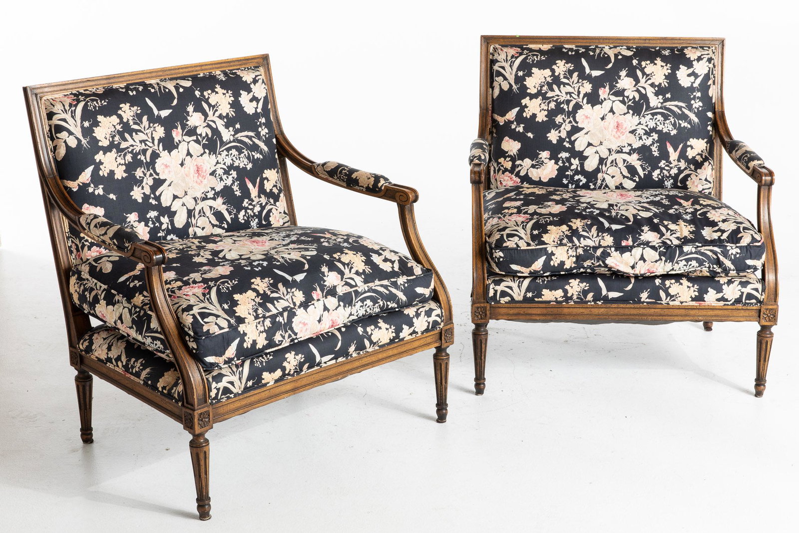 Pair of Louis XVI Style Open Armchairs, 20th Century: Property from a Savannah, GA Estate Description: Pair of Louis XVI Style Open Armchairs, 20th Century, each with rectangular back flanked by open arms centering a loose-fitted cushion, raised on t